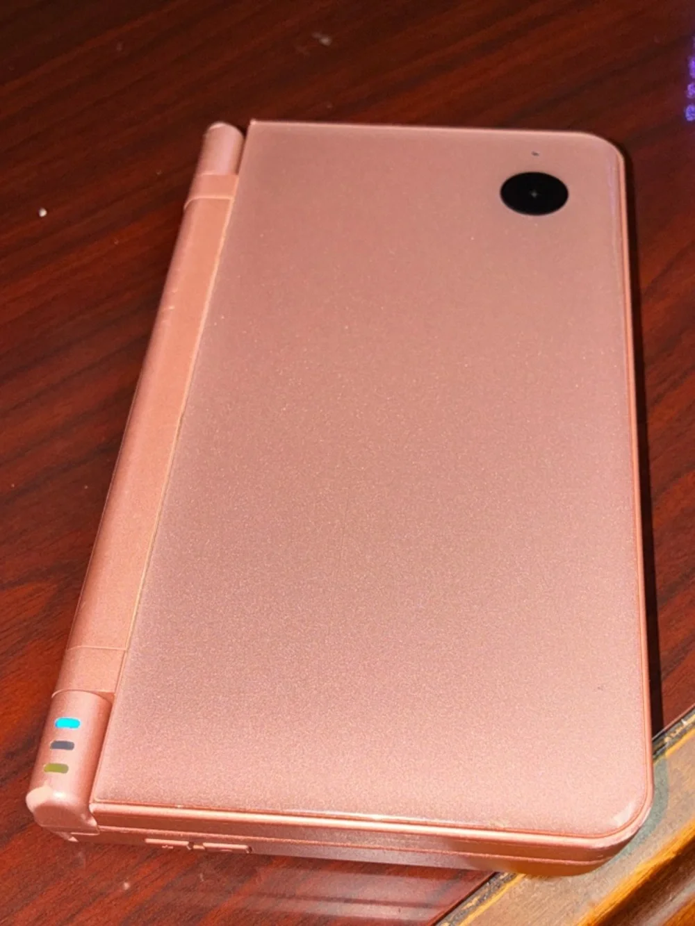 Nintendo DSi Portable Gaming Console in Metallic Copper 2008.